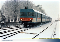 L' ALn 668.1107 in testa ad un treno locale in arrivo a Besana nell'inverno 1985/86
