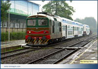 Nuovo invio di carrozze Vivalto il 7/10/2006. La D343.2018 sotto una fitta pioggia attende di incrociare il Reg. 5131. Besana 07/10/06